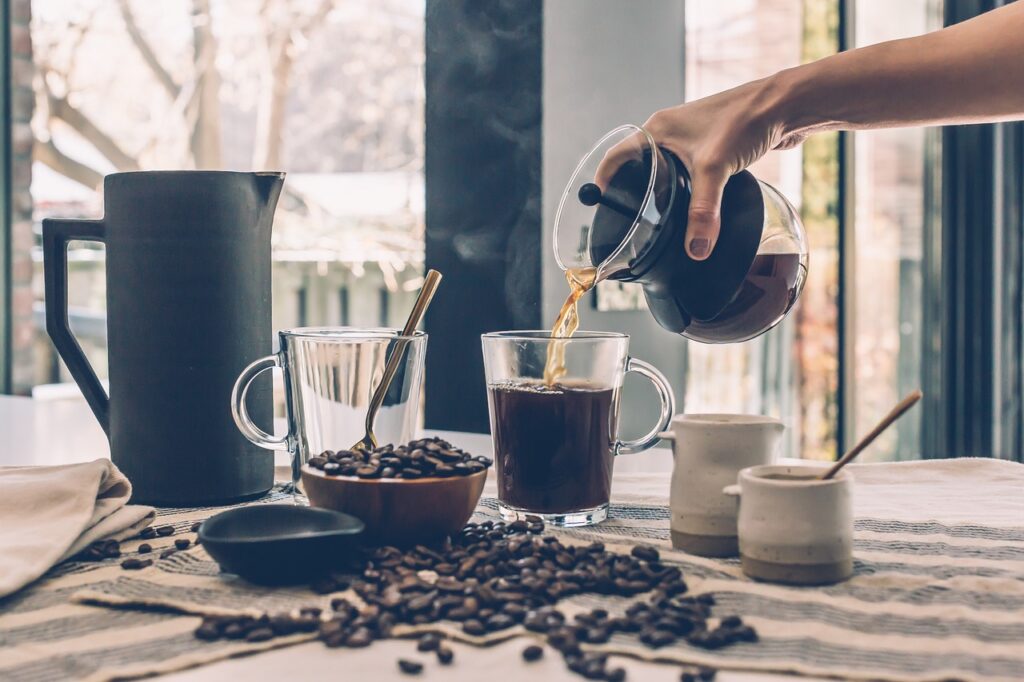 Coffee being poured into a glass